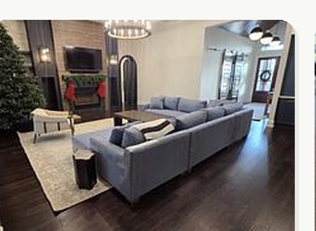 Furniture and gallery pieces arranged in a luxury living room after white glove delivery