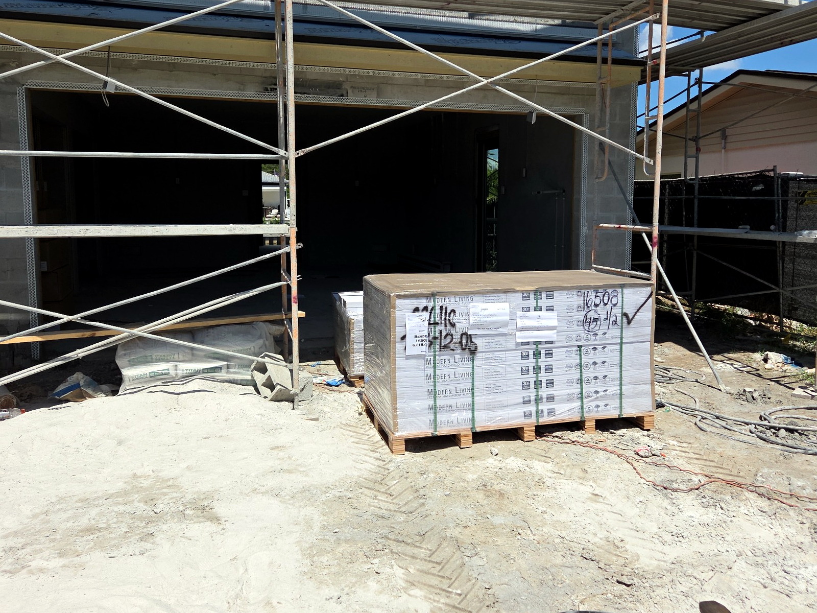 Materials dropped off and set exactly where needed on an active jobsite