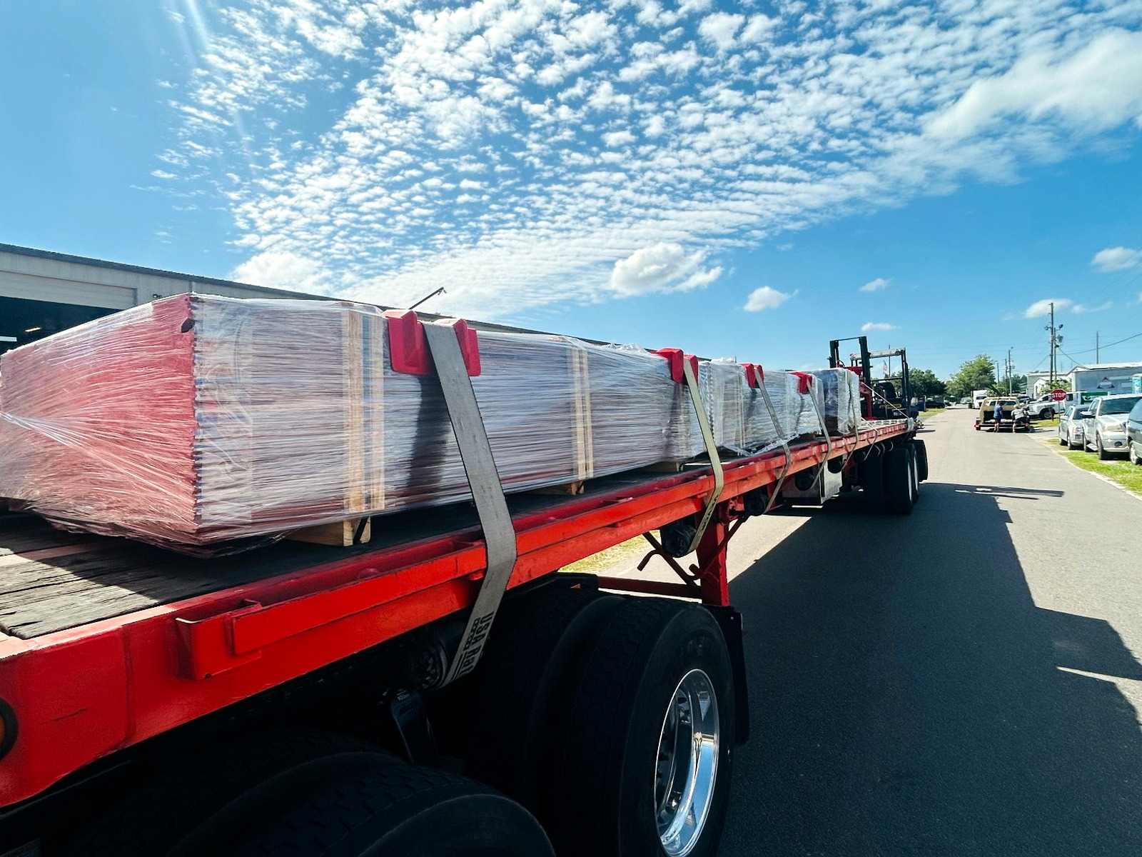 Flatbed freight loaded and secured for final-mile delivery