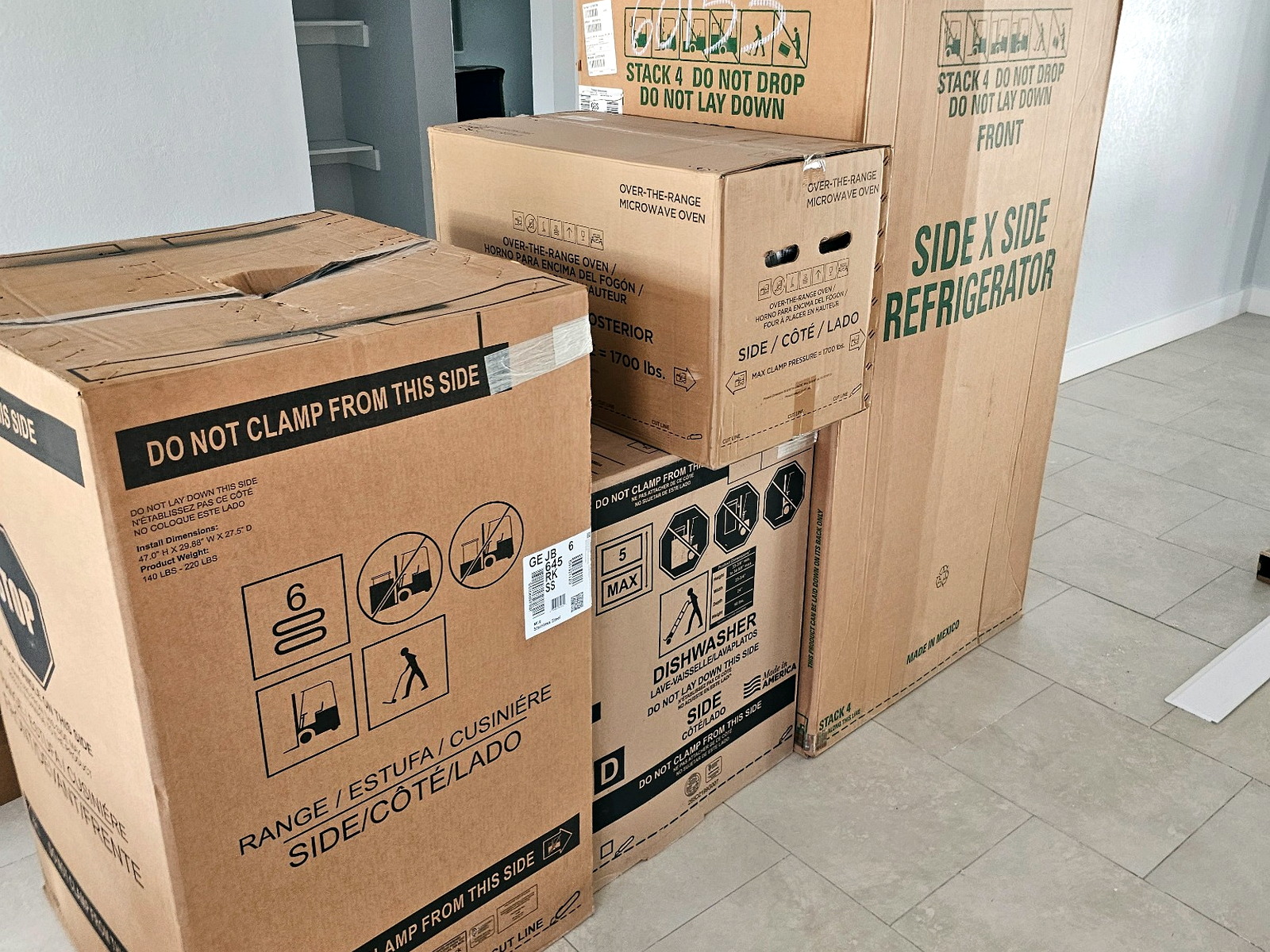 Large appliances delivered inside a finished home by a final-mile crew