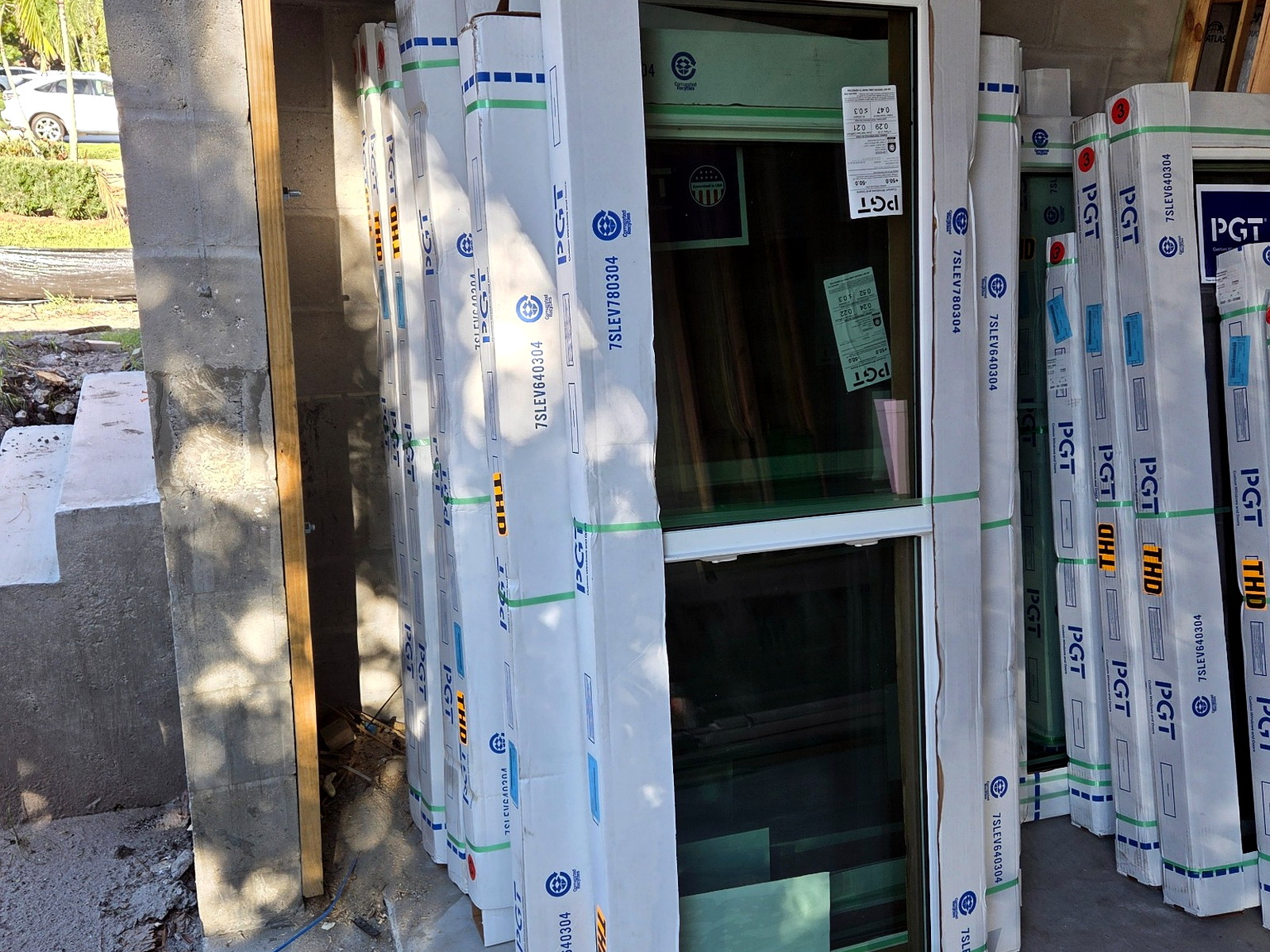 Windows and doors carefully delivered as protected freight to a jobsite
